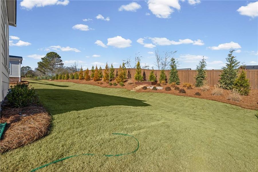 Exterior details and patio area of a home in Berkeley Mill, Cumming (Image 17).