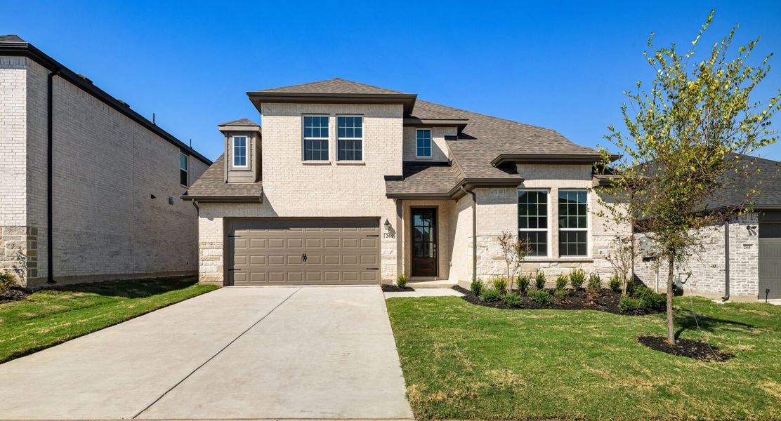 Front exterior of a new home in Elevon, Lavon, TX, highlighting curb appeal (Image 22).