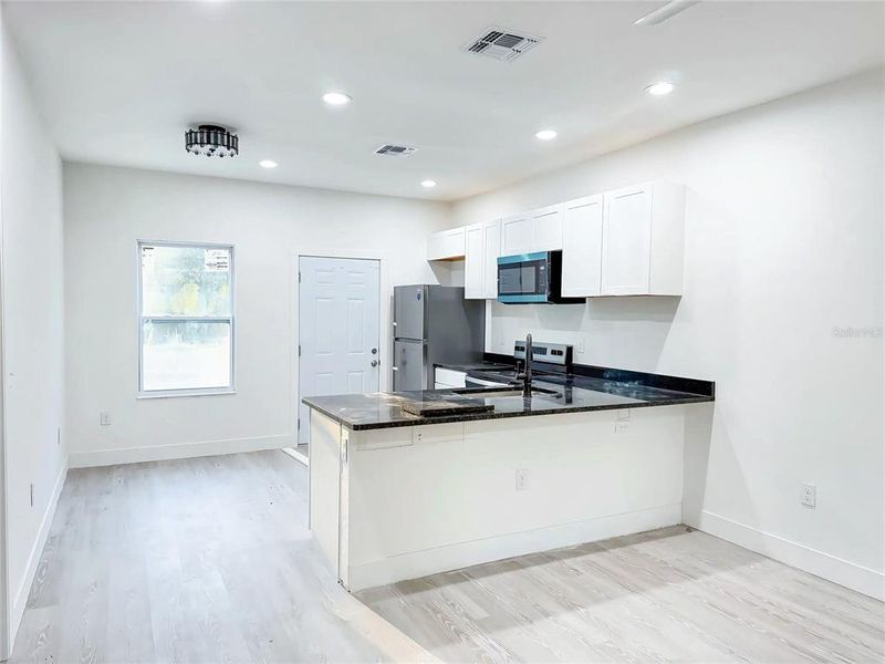 Furnished interior view inside a new home in , Interlachen (Image 9).