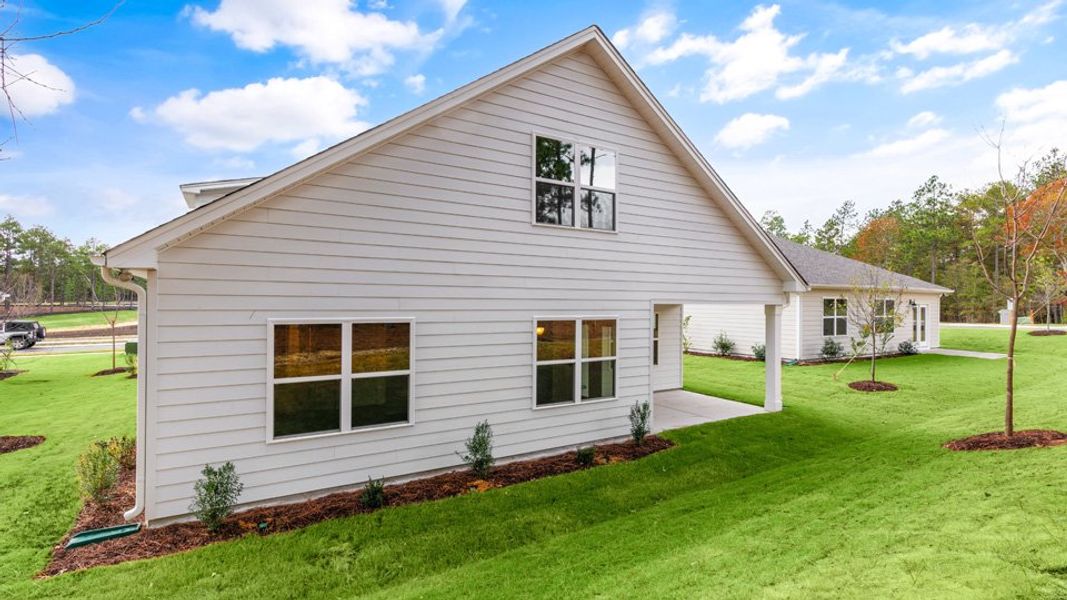 Exterior details and patio area of a home in The Villas at Martin Farms, Aberdeen (Image 23).