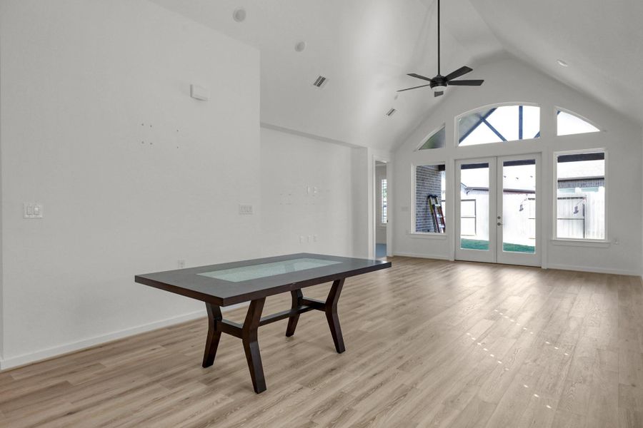 This is the dining area with easy access to the kitchen and open to the family room.