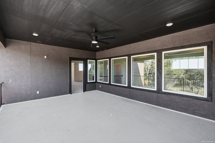 Exterior details and patio area of a home in Heimer Estates at Garden Ridge, San Antonio (Image 29).