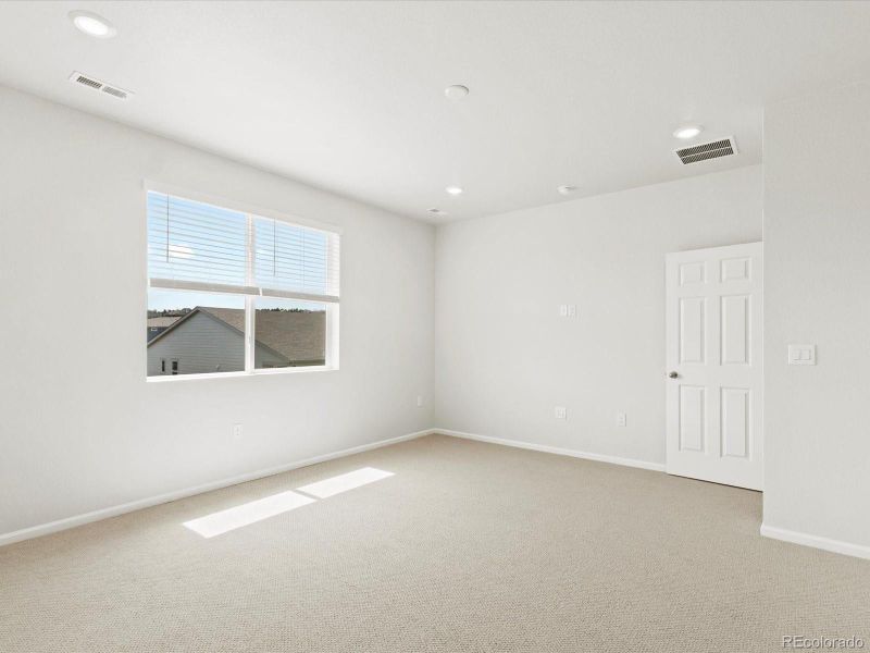 Spacious, unfurnished interior of a new home in Poudre Heights: The Alpine Collection, Windsor (Image 39).