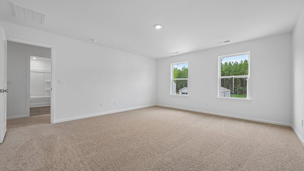 Spacious, unfurnished interior of a new home in Mangum Farms, Stem (Image 22).
