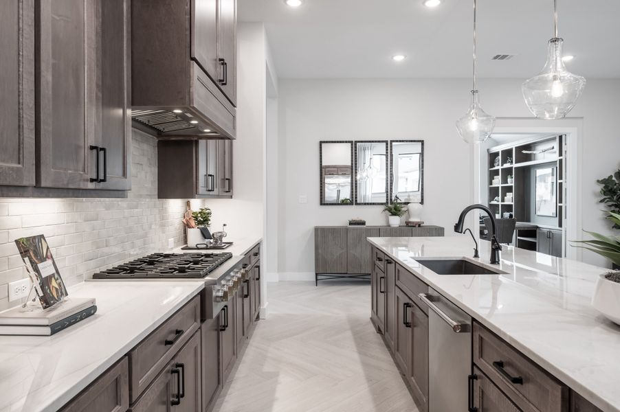 Representative furnished interior of a home built from the Carignan by Tri Pointe Homes in Sienna 80′, Missouri City (Image 10).