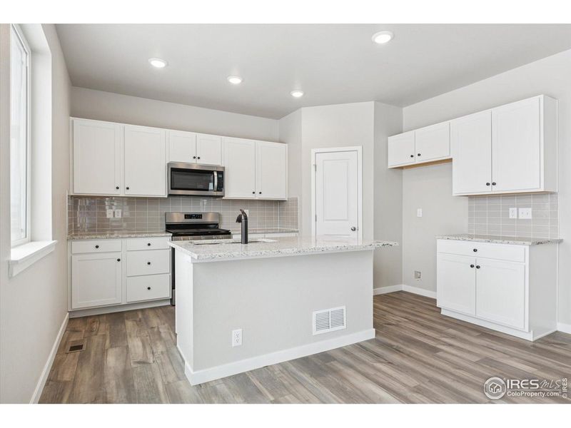 Furnished interior view inside a new home in The Overlook at Johnstown Farms, Johnstown (Image 8).