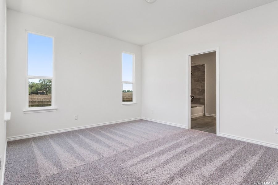 Spacious, unfurnished interior of a new home in Woodside Farms, Seguin (Image 9).