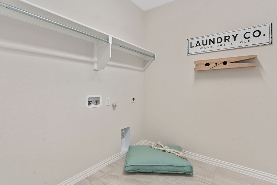 Plan 1534 Laundry Room Representative Photo by American Legend Homes