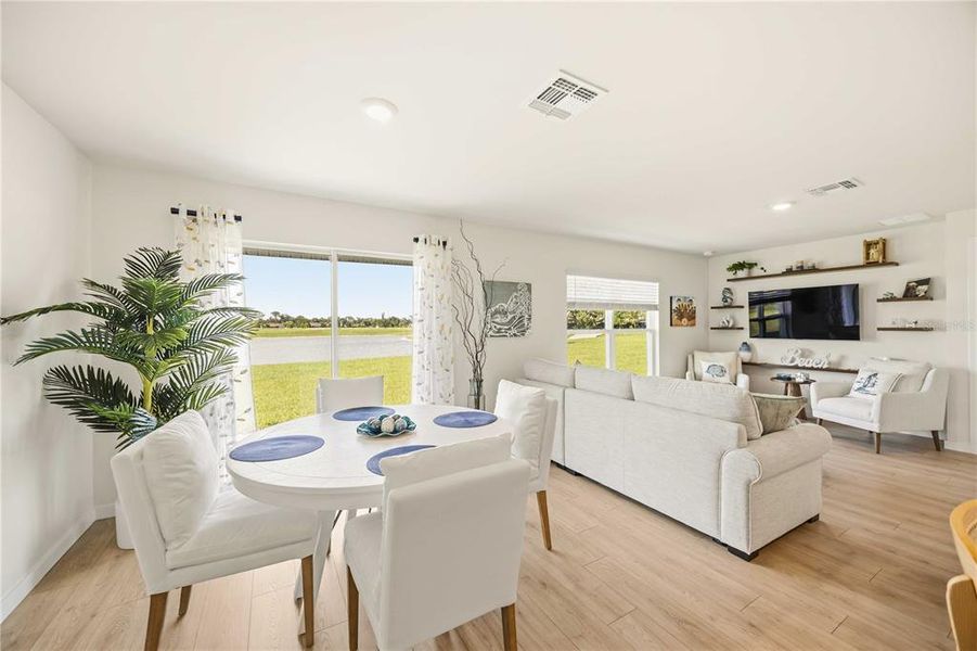 Furnished interior view inside a new home in Central Parc, North Port (Image 42).