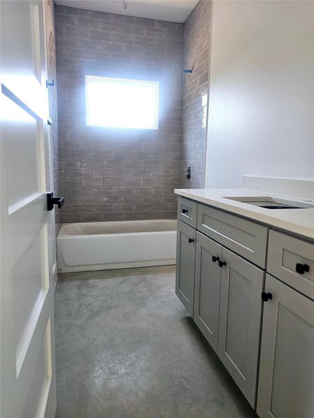 Hall Guest Bathroom with vanity,  washtub / shower combination