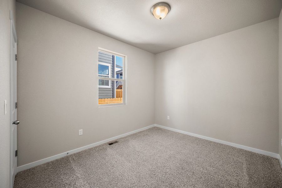 Spacious, unfurnished interior of a new home in Ridge at Lorson Ranch, Colorado Springs (Image 26).
