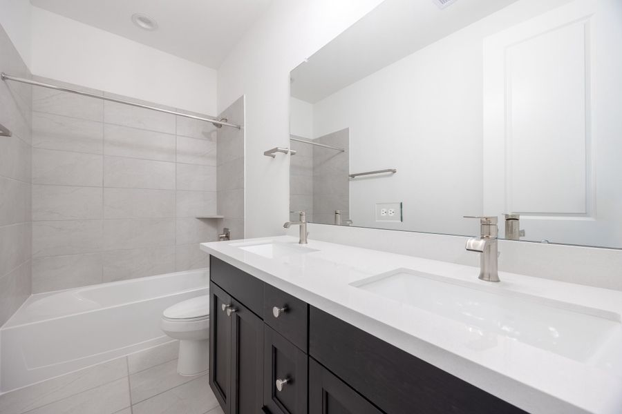 Representative furnished interior of a home built from the Elias by Risewell Homes in Sunterra, Katy (Image 5). Representative furnished interior of a home built from the Elias by Risewell Homes in Sunterra, Katy (Image 5).