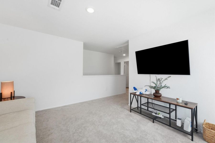 Furnished interior view inside a new home in Pinewood at Grand Texas, New Caney (Image 12).