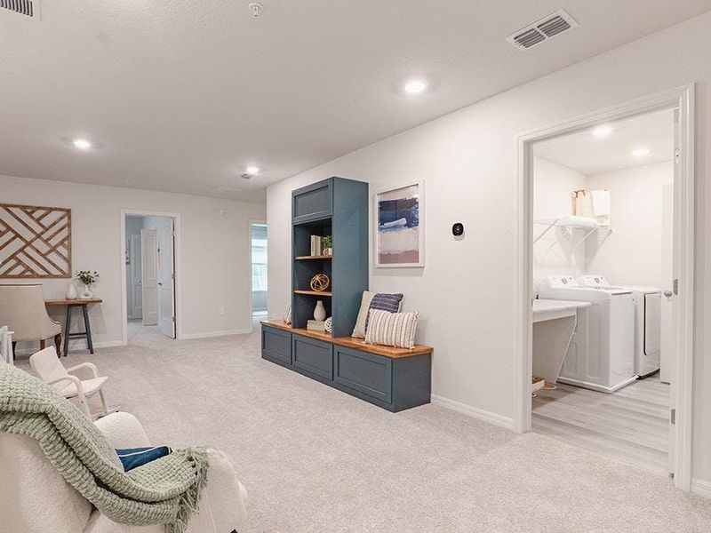 Upstairs, a large loft provides desirable flex-use space - Aspen townhome by Highland Homes Upstairs, a large loft provides desirable flex-use space - Aspen townhome by Highland Homes