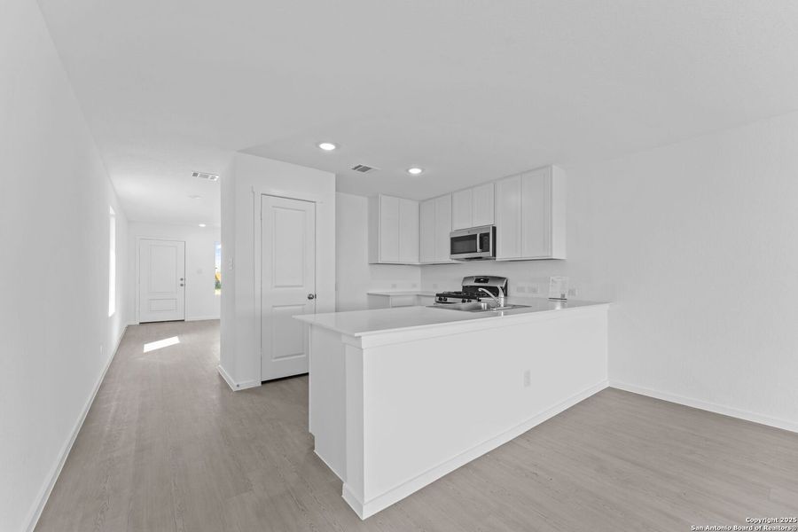 Furnished interior view inside a new home in , New Braunfels (Image 6).