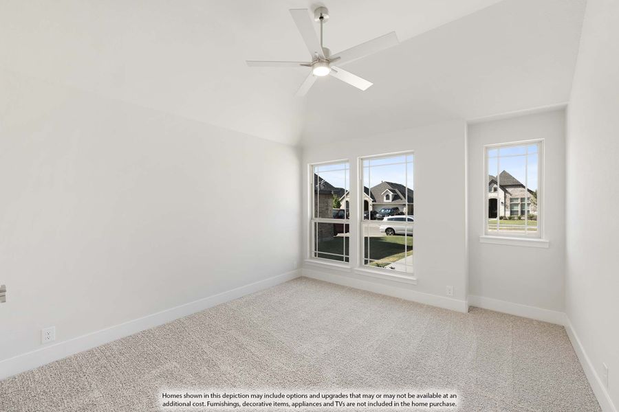 Empty bedroom with vaulted ceiling, ceiling fan, carpet flooring, and two windows overlooking neighborhood Empty bedroom with vaulted ceiling, ceiling fan, carpet flooring, and two windows overlooking neighborhood