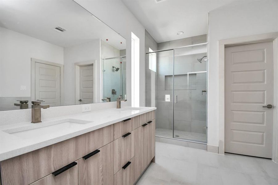 Primary Bedroom Bathroom with Spacious Walk-in Shower and Freestanding Tub