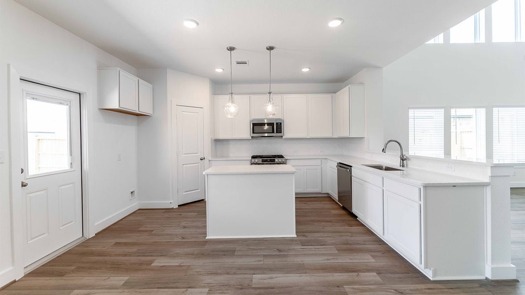 Furnished interior view inside a new home in Massey Oaks, Pearland (Image 3).