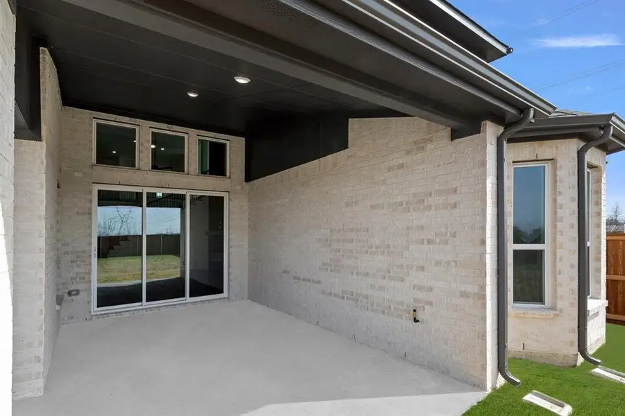 Exterior details and patio area of a home in Inspiration, Lucas (Image 3).