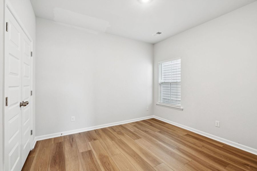 Spacious, unfurnished interior of a new home in Saint John's Lake: Arbor Collection, Johns Island (Image 25).