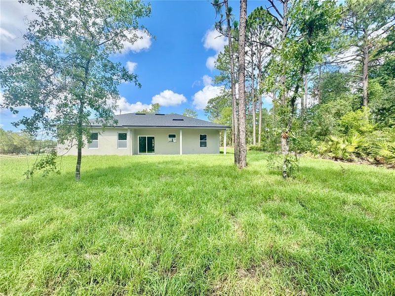Exterior details and patio area of a home in , Citrus Springs (Image 20).