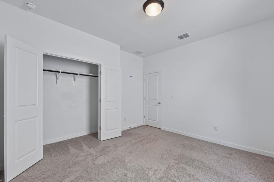 Spacious, unfurnished interior of a new home in Parkton Square, Kyle (Image 38).