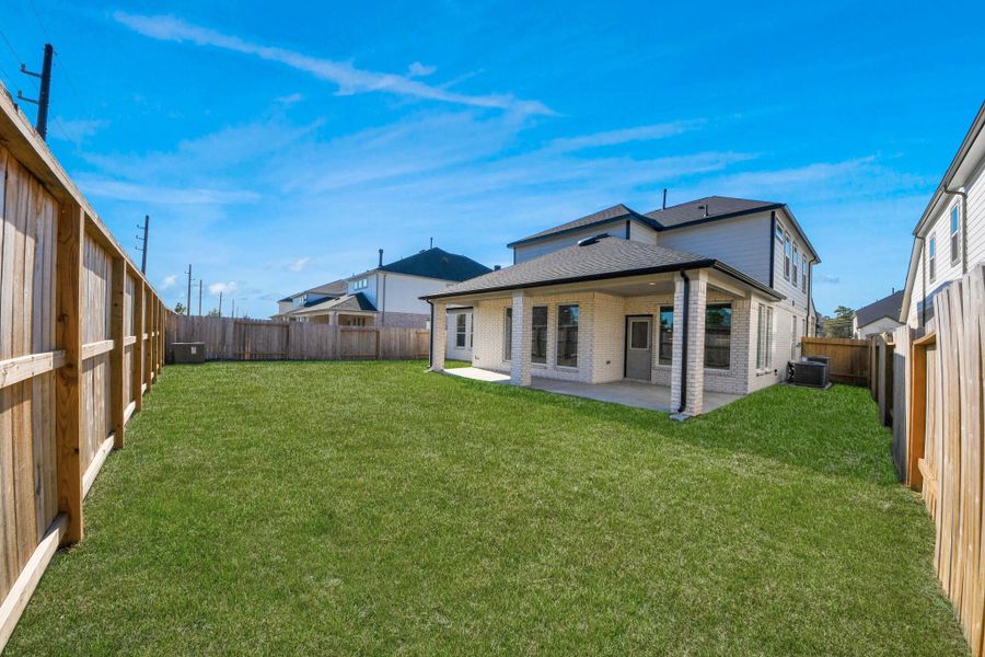 Backyard retreat, offering an abundance of space for kids to play and explore. The possibilities are endless in this outdoor haven, where the joy of open-air activities and family gatherings awaits.