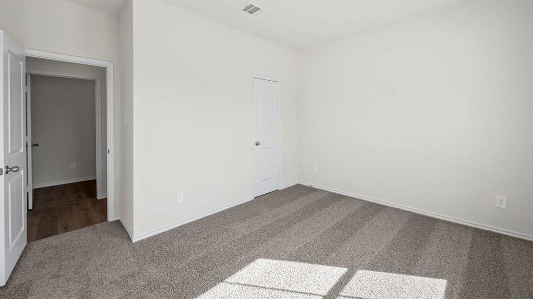 Spacious, unfurnished interior of a new home in Enclave at Pecan Creek, Providence Village (Image 32).
