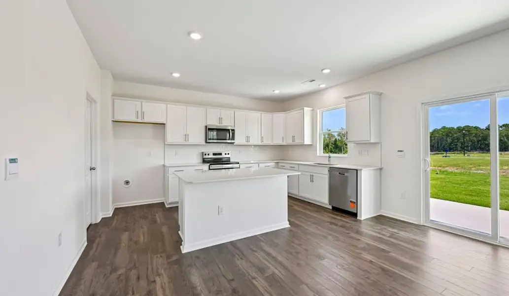 Furnished interior view inside a new home in Shahbain Reserve, Raeford (Image 7). Furnished interior view inside a new home in Shahbain Reserve, Raeford (Image 7).