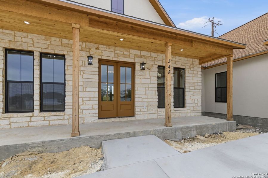 Exterior details and patio area of a home in , Bandera (Image 28).