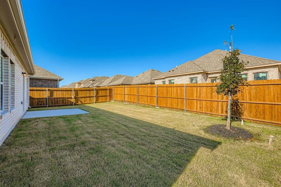 Exterior details and patio area of a home in Summerwood Estates, Red Oak (Image 20).