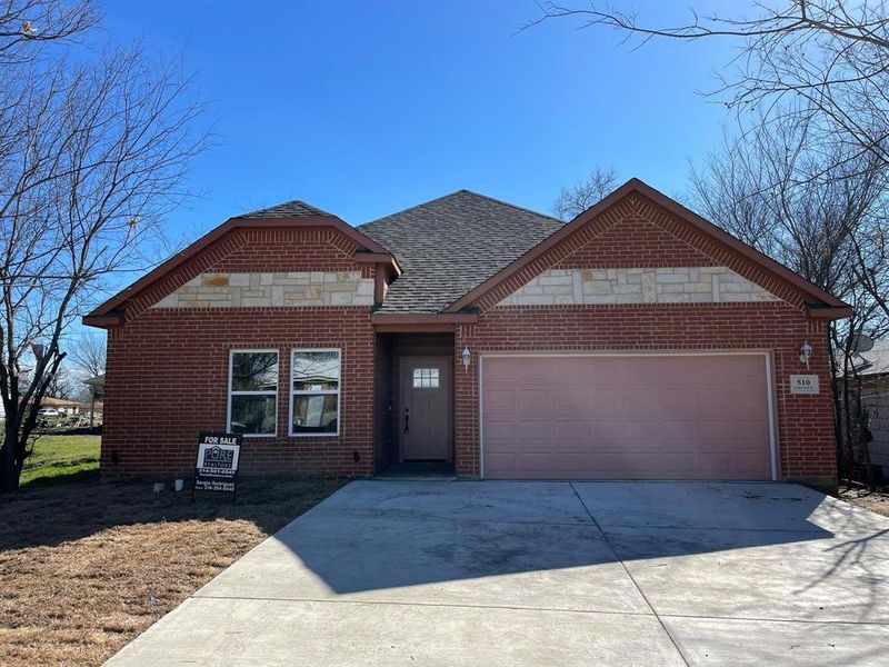 View of front of house with a garage