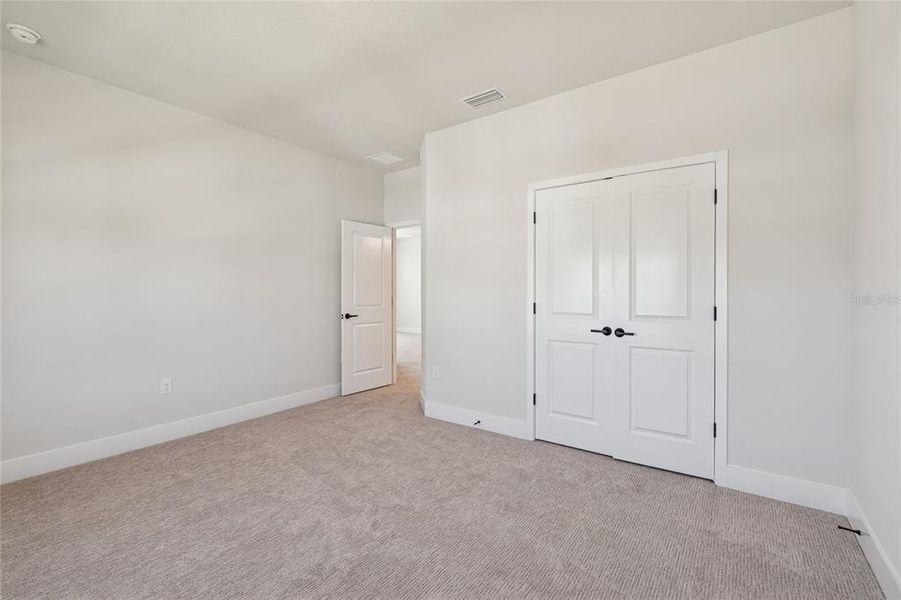 Spacious, unfurnished interior of a new home in Emerald Landing at Waterside at Lakewood Ranch – Cottage Series, Sarasota (Image 22).