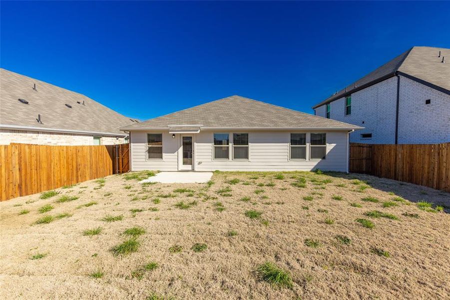 Front exterior of a new home in Stratton Place, Greenville, TX, highlighting curb appeal (Image 19).