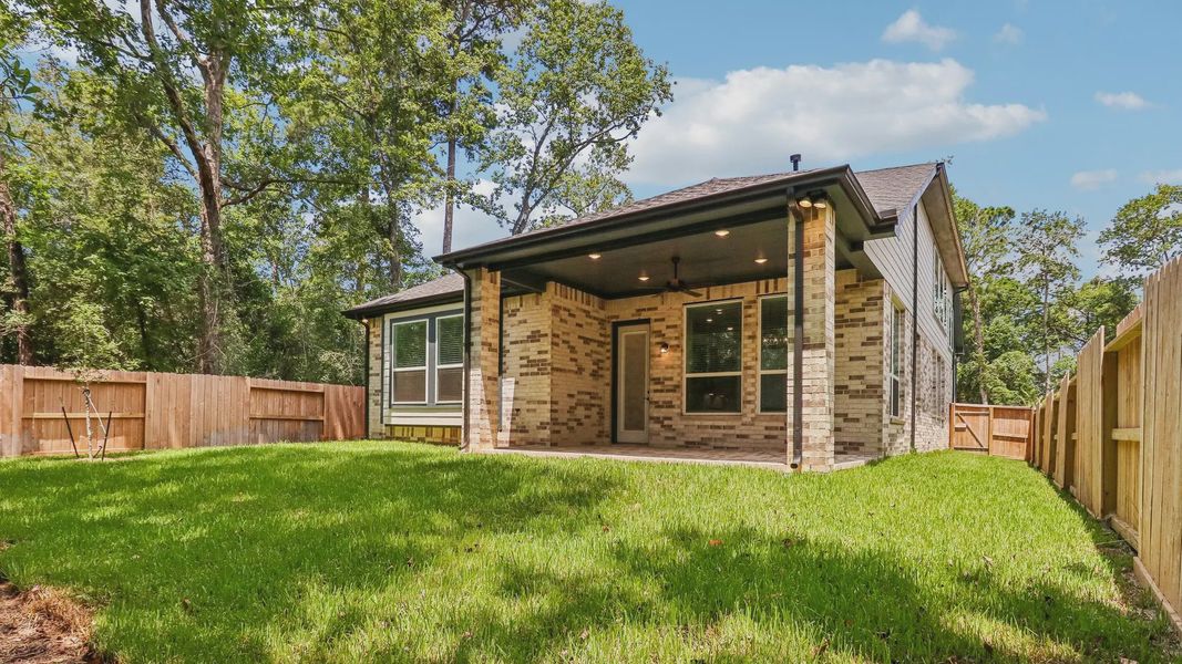 Exterior details and patio area of a home in The Woodland Hills 50', Willis (Image 4). Exterior details and patio area of a home in The Woodland Hills 50', Willis (Image 4).