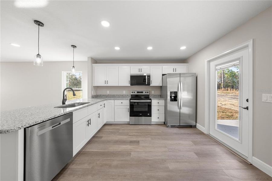 Furnished interior view inside a new home in , Williston (Image 6).