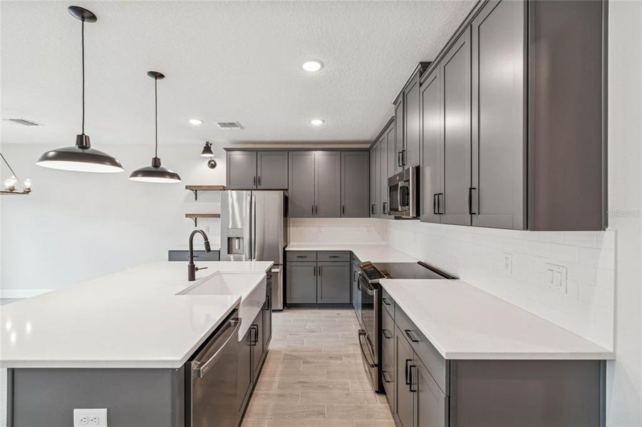 Furnished interior view inside a new home in Aspire at Canter Creek, Davenport (Image 5).