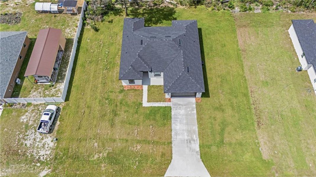 Front exterior of a new home in , Ocala, FL, highlighting curb appeal (Image 26).