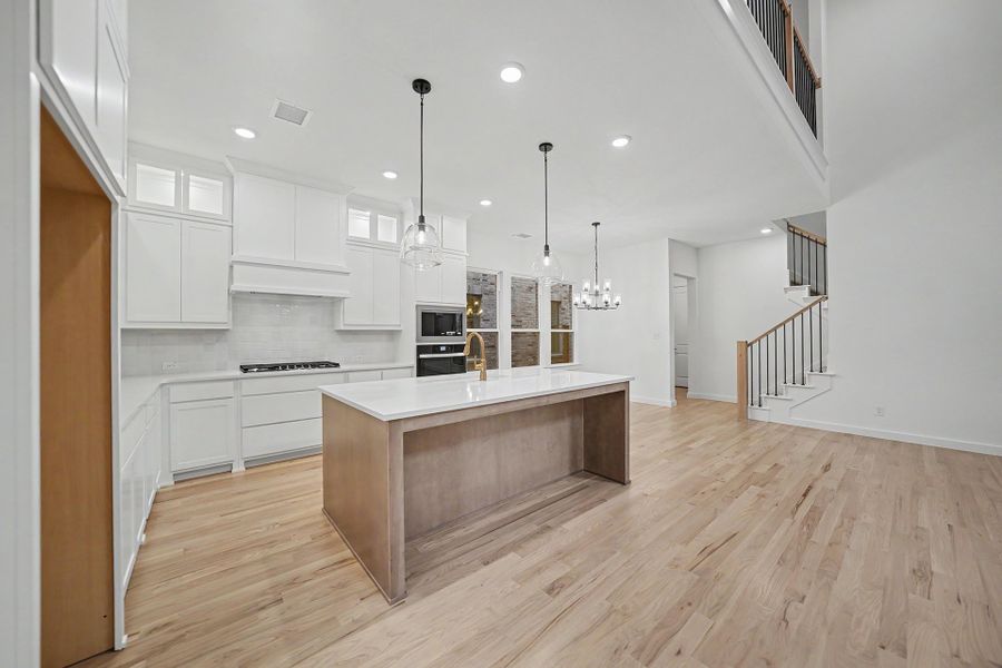 Furnished interior view inside a new home in Light Farms Brenham - 40' Lots, Celina (Image 8).