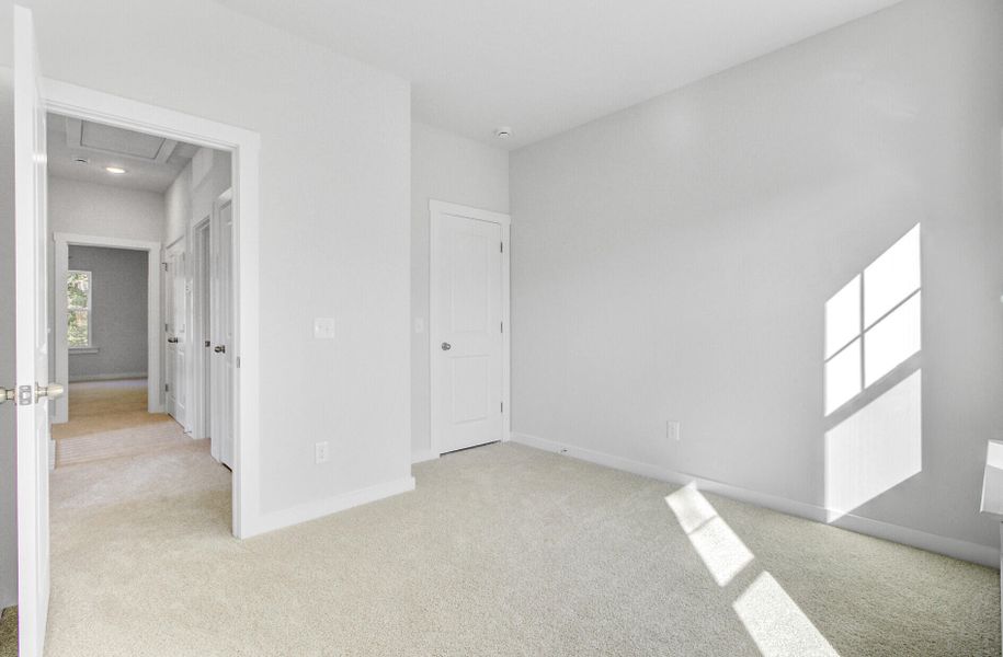 Spacious, unfurnished interior of a new home in Indigo Grove Townhomes, Johns Island (Image 42).