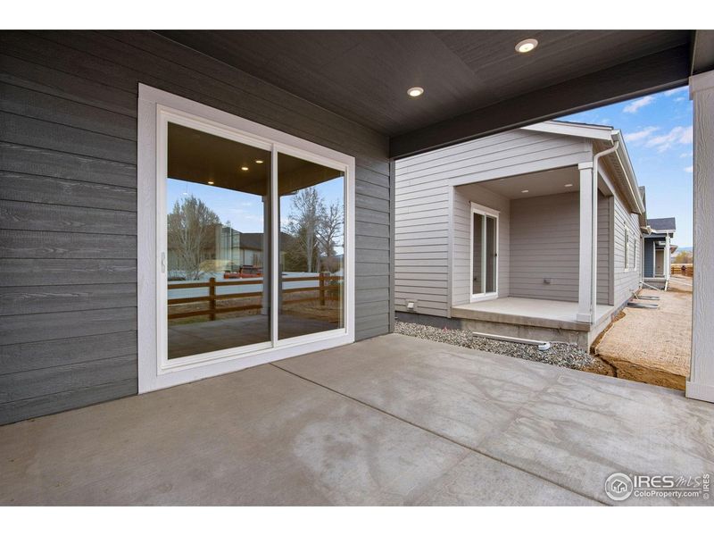 Exterior details and patio area of a home in Westside Crossing, Berthoud (Image 4).
