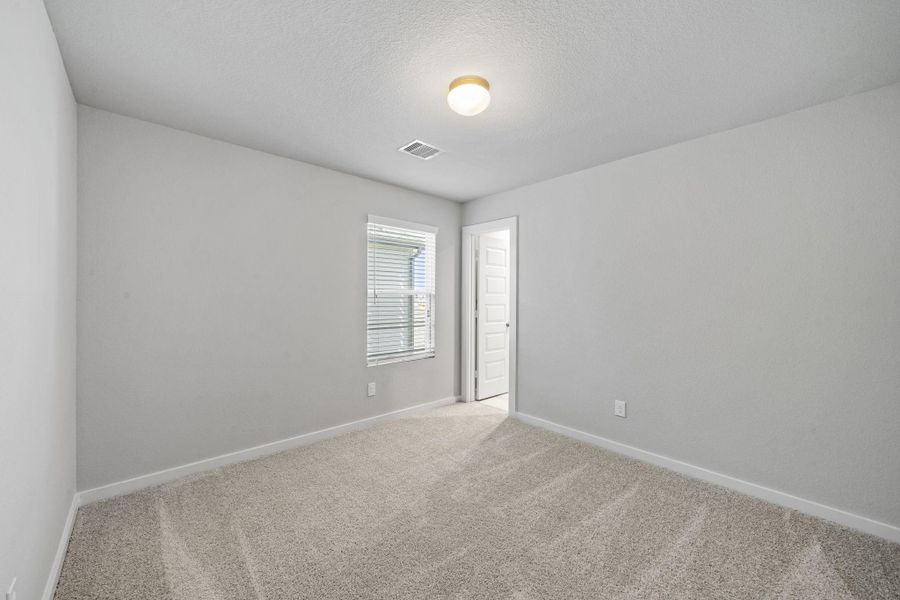 Spacious, unfurnished interior of a new home in Grand Oaks Village, Houston (Image 24).