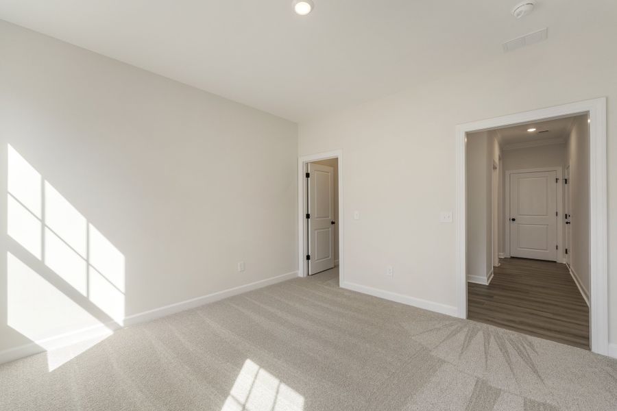 Spacious, unfurnished interior of a new home in Landing at Pine Lake, Anderson (Image 25).