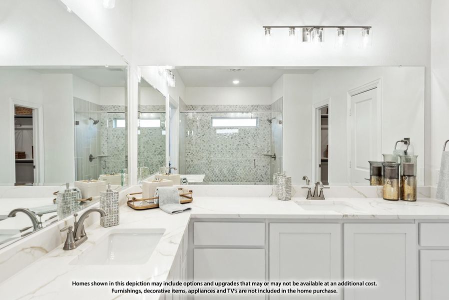 Master bathroom with double sinks, marble countertops, large mirror, and glass-enclosed shower with tile walls. Master bathroom with double sinks, marble countertops, large mirror, and glass-enclosed shower with tile walls.