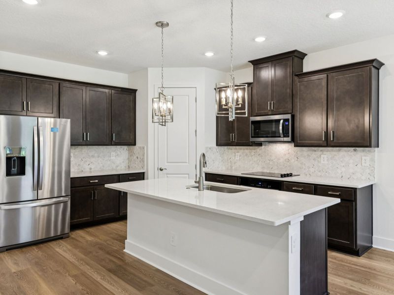 Furnished interior view inside a new home in Ridgehaven - Signature Series, Ormond Beach (Image 4).