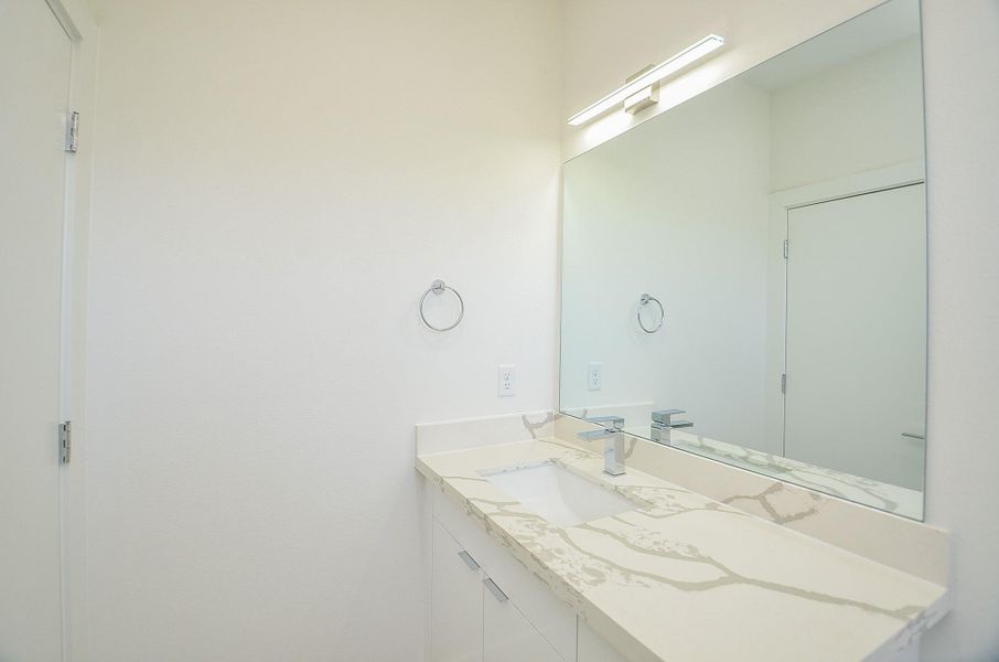 Bathroom on First Floor (Sample photo from similar floor plan built by the builder)
