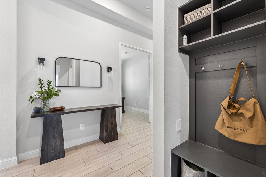 Convenient mudroom/entry area directly accessible from the garage. Convenient mudroom/entry area directly accessible from the garage.