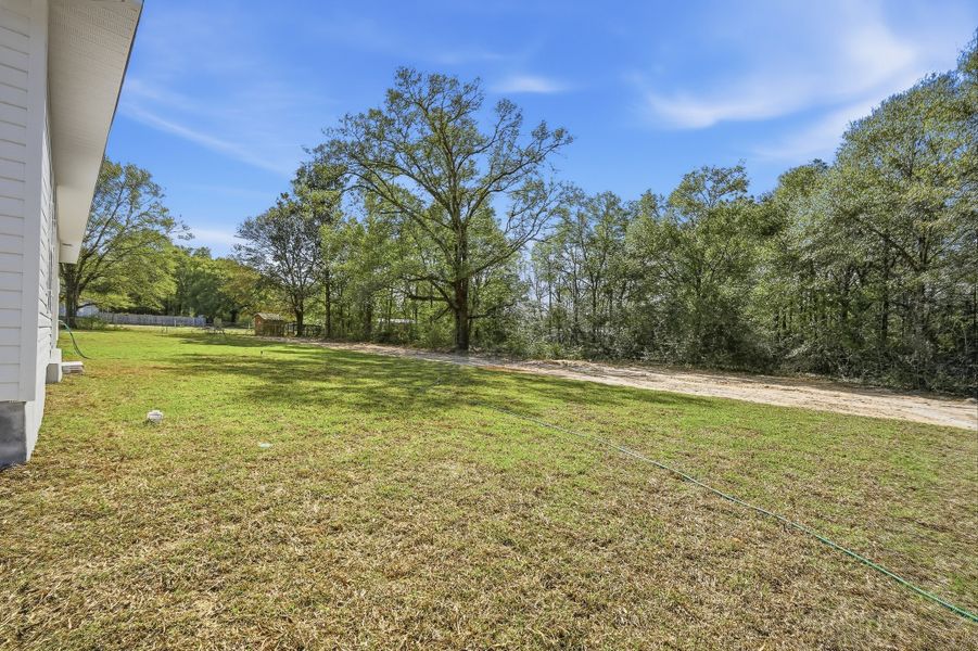 Exterior details and patio area of a home in , Crestview (Image 27).