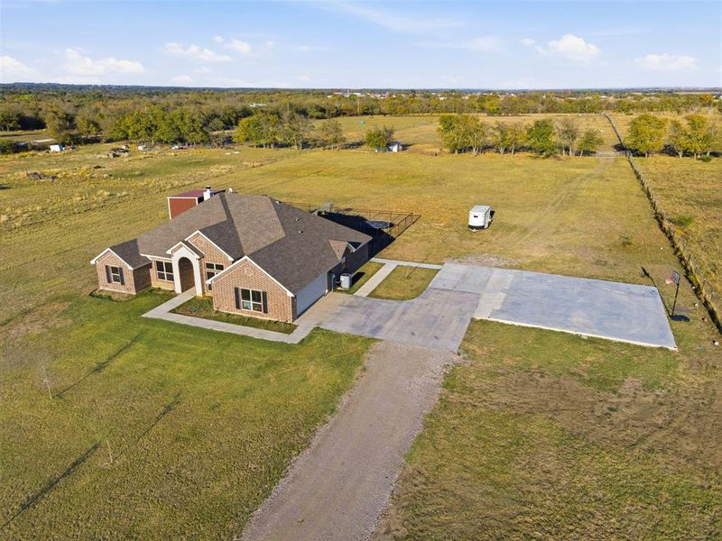 Front exterior of a new home in , Grandview, TX, highlighting curb appeal (Image 21).