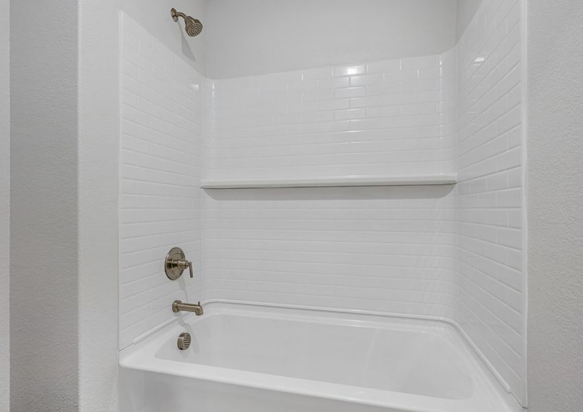 The secondary bathroom has a shower-tub combo. The secondary bathroom has a shower-tub combo.
